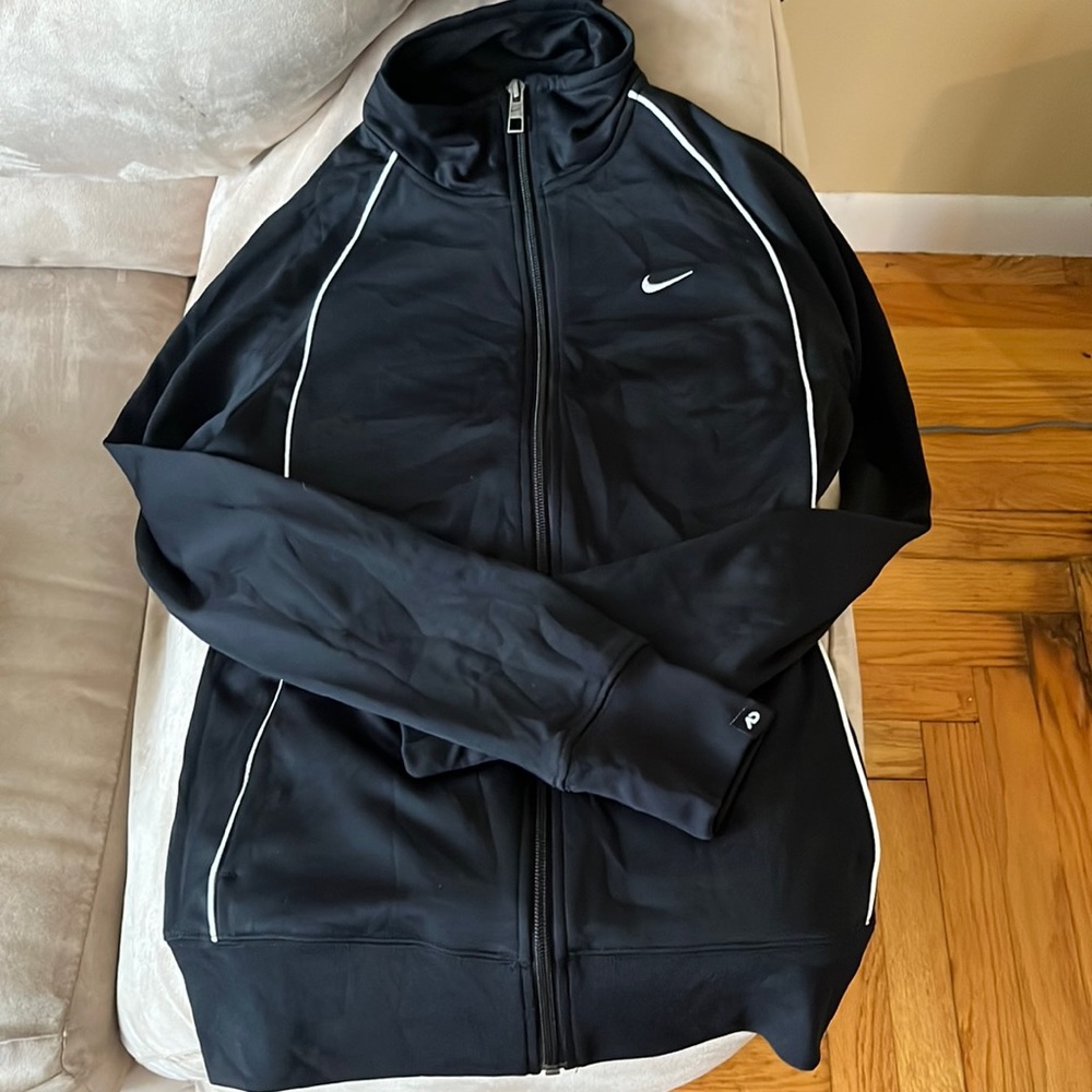 Black Nike track jacket. Size small. Worn once